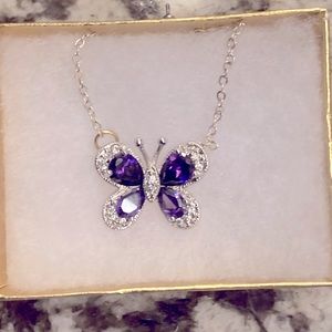Butterfly Pendant Necklace with Lovely Faceted Purple Stones.